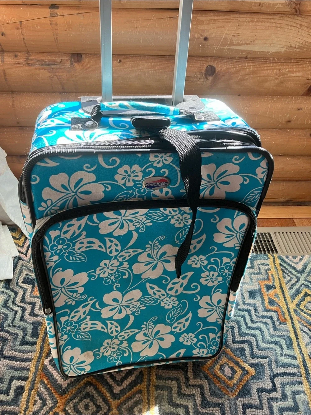 American Tourister blue hibiscus 20 x 14 x 9 small suitcase carryon